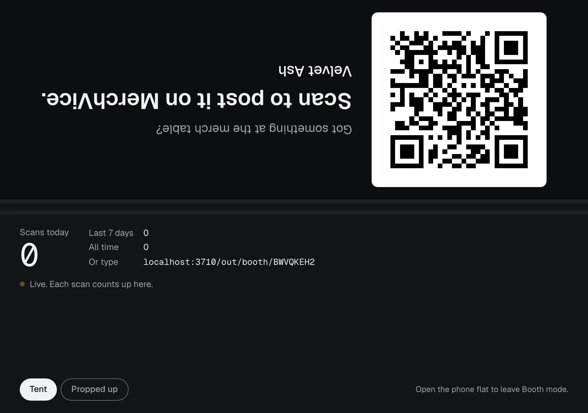 The Duo half folded: a QR code on the top half, the day's scans on the bottom half