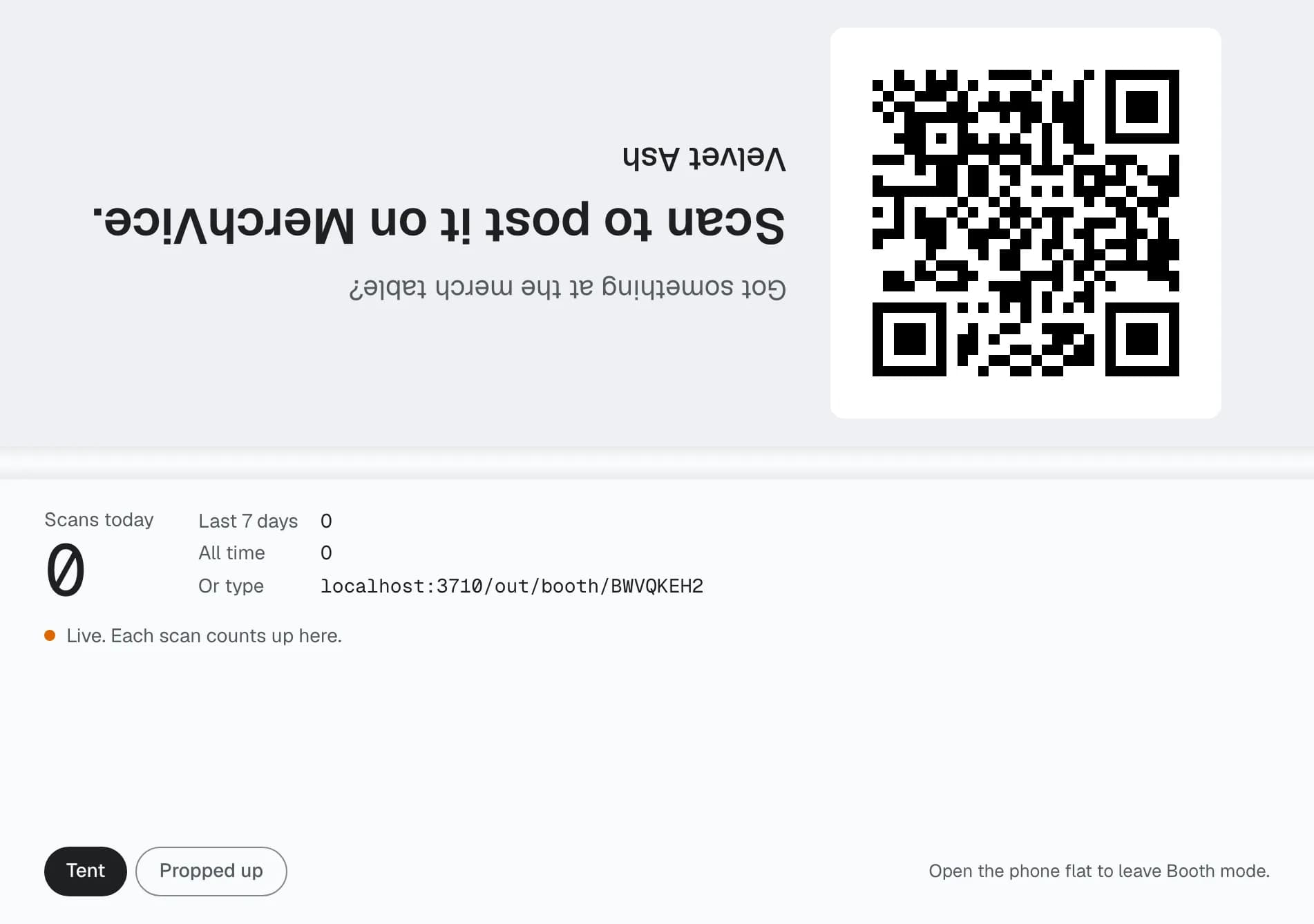 The Duo half folded: a QR code on the top half, the day's scans on the bottom half