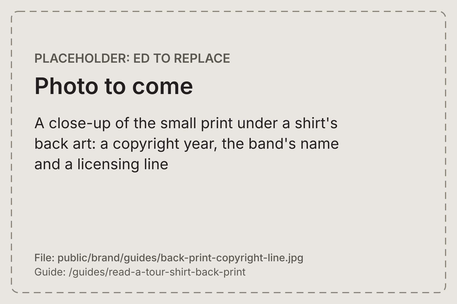 A close-up of the small print under a shirt's back art: a copyright year, the band's name and a licensing line