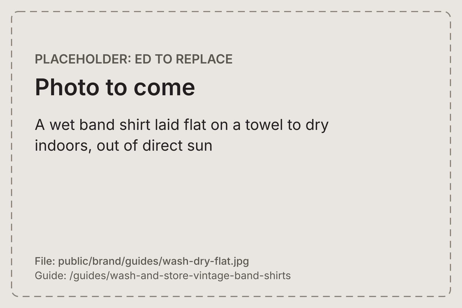 A wet band shirt laid flat on a towel to dry indoors, out of direct sun